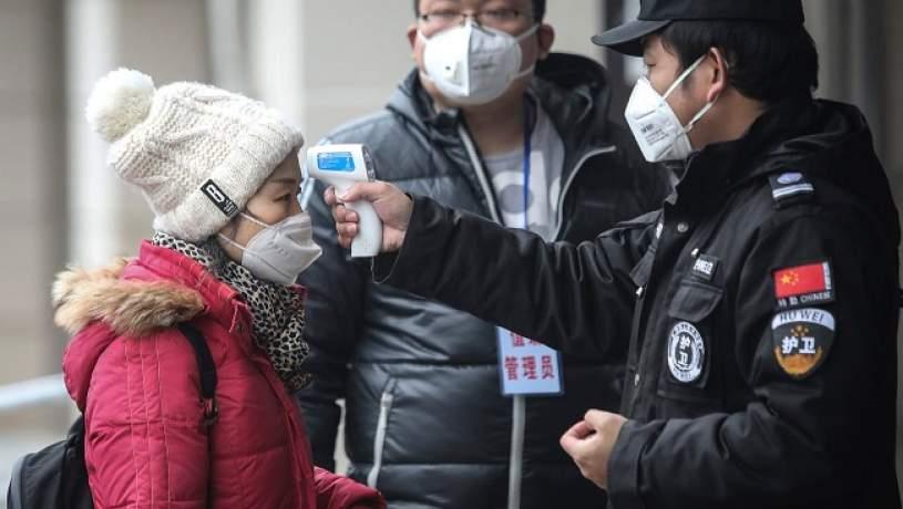 زن چینی ماموران بررسی ابتلا به ویروس کرونا را گول زد